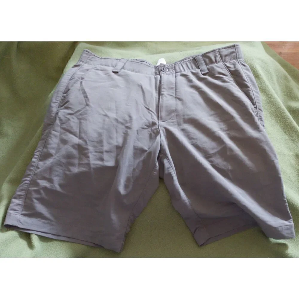Under Armour Gray loose shorts size 34. They're made with a lightweight, highly